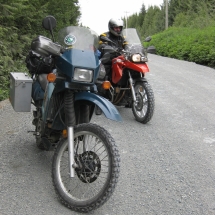 The-KLR650-and-Mike-Whitfield-on-his-BMW-F650GS-at-a-stop-on-the-Holberg-Road
